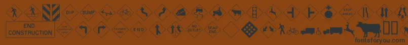 Roadwarningsign Font – Black Fonts on Brown Background