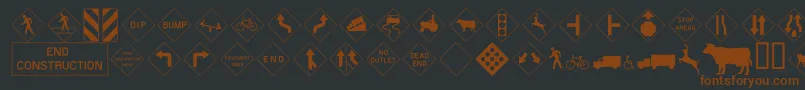 Roadwarningsign-fontti – ruskeat fontit mustalla taustalla