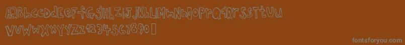 Chopstickfont Font – Gray Fonts on Brown Background