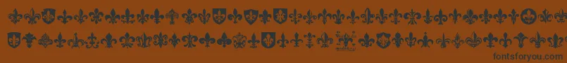 More about FleurDeLis Font FleurDeLis Font – Black Fonts on Brown Background