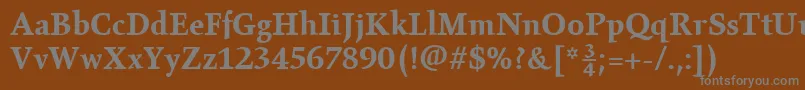 GilgameshBoldPlain-fontti – harmaat kirjasimet ruskealla taustalla