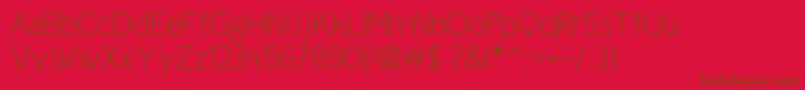 Ciclefina Font – Brown Fonts on Red Background