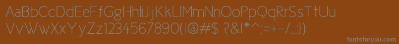 Ciclefina Font – Gray Fonts on Brown Background