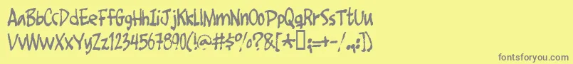 フォントFootfight – 黄色の背景に灰色の文字