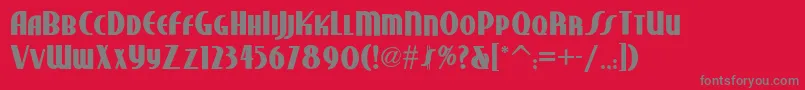 フォントStudebakernf ffy – 赤い背景に灰色の文字