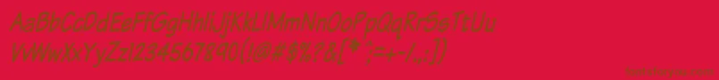 Fonte KomikaTextTightItalic – fontes marrons em um fundo vermelho