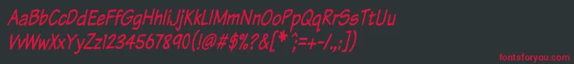 Czcionka KomikaTextTightItalic – czerwone czcionki na czarnym tle