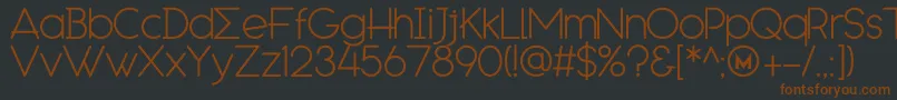 EngcarnationDemo-fontti – ruskeat fontit mustalla taustalla