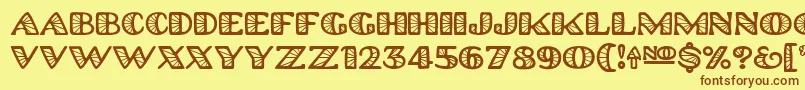 フォントPlatinumhubcapsspoked – 茶色の文字が黄色の背景にあります。