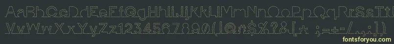 Czcionka IamonlinewithuDotted2 – żółte czcionki na czarnym tle