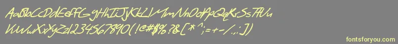 SfScribbledSansBoldItalic-fontti – keltaiset fontit harmaalla taustalla