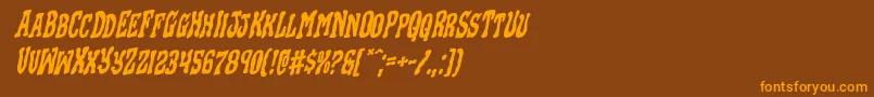 フォントBlackgunkrotal – オレンジ色の文字が茶色の背景にあります。