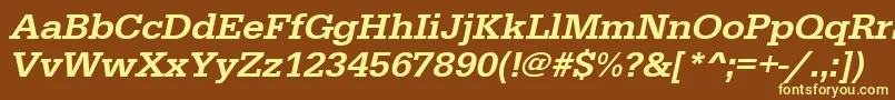 UrwegyptiennetmedwidOblique-fontti – keltaiset fontit ruskealla taustalla