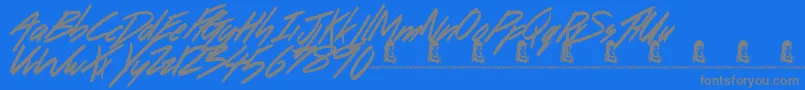DancingOnTheBeach Font – Gray Fonts on Blue Background