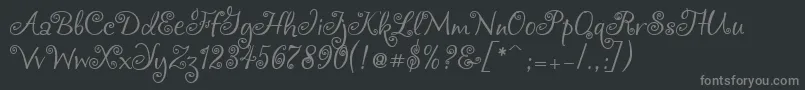 Chocogirl-fontti – harmaat kirjasimet mustalla taustalla
