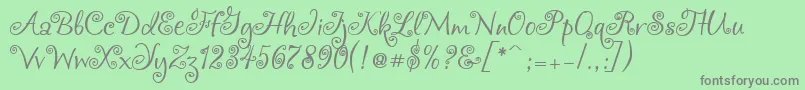 フォントChocogirl – 緑の背景に灰色の文字