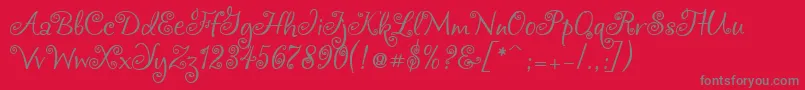 Chocogirl-fontti – harmaat kirjasimet punaisella taustalla