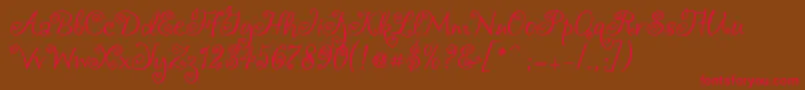 フォントChocogirl – 赤い文字が茶色の背景にあります。