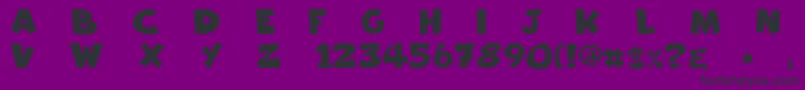 Freakomix Font – Black Fonts on Purple Background