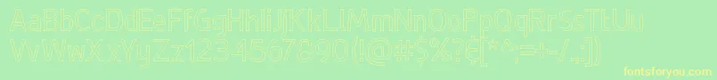 フォントDeLuxeHollow – 黄色の文字が緑の背景にあります