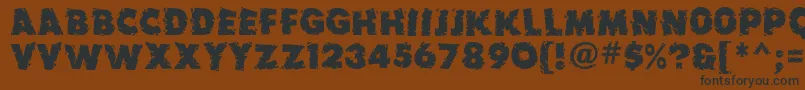 Earthquake ffy Font – Black Fonts on Brown Background