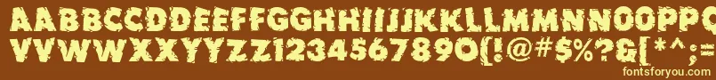 Earthquake ffy Font – Yellow Fonts on Brown Background