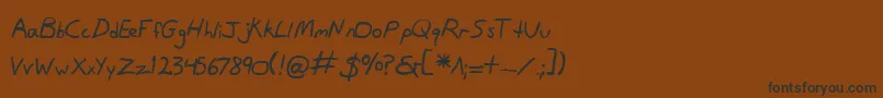 フォントDanv2b – 黒い文字が茶色の背景にあります