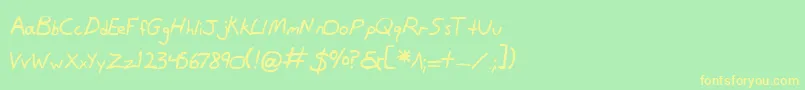 フォントDanv2b – 黄色の文字が緑の背景にあります