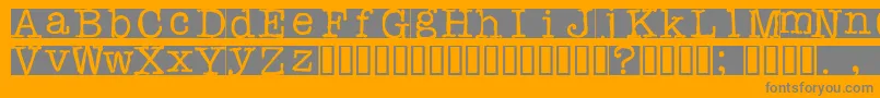 Rubberstamp-Schriftart – Graue Schriften auf orangefarbenem Hintergrund