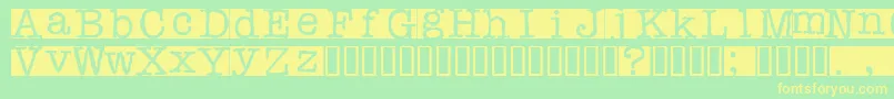 Rubberstamp-Schriftart – Gelbe Schriften auf grünem Hintergrund