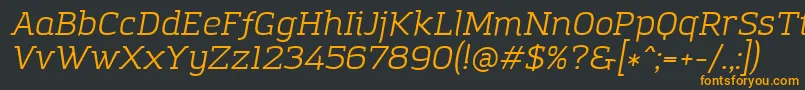 フォントAmazingGroteskBookItalic – 黒い背景にオレンジの文字