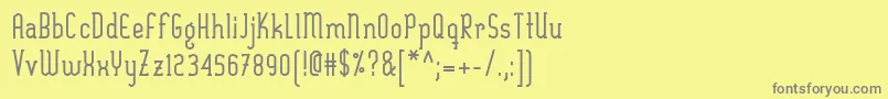 フォントSexythingBold – 黄色の背景に灰色の文字