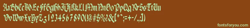 フォントPenchantnarrowRegular – 緑色の文字が茶色の背景にあります。