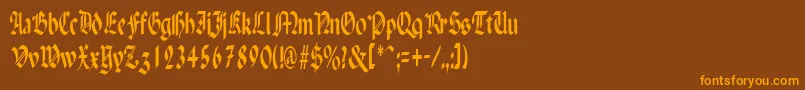 フォントPenchantnarrowRegular – オレンジ色の文字が茶色の背景にあります。