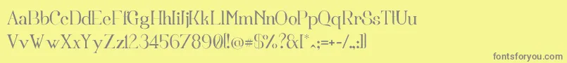 フォントFortunata – 黄色の背景に灰色の文字