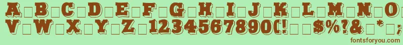 NorthFaceDisplayCapsSsi-fontti – ruskeat fontit vihreällä taustalla