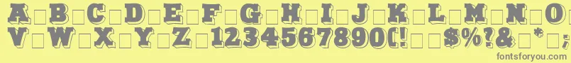 NorthFaceDisplayCapsSsi-fontti – harmaat kirjasimet keltaisella taustalla