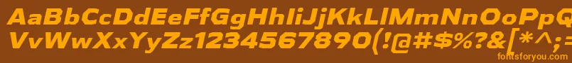 フォントAthabascaExEbIt – オレンジ色の文字が茶色の背景にあります。