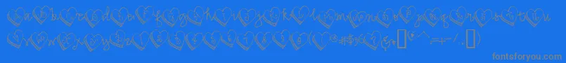 DjCandyHeart-Schriftart – Graue Schriften auf blauem Hintergrund