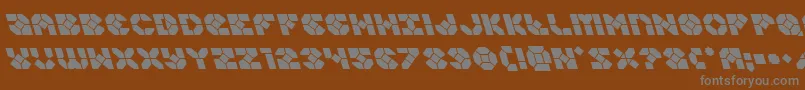 Zoomrunnerleft-fontti – harmaat kirjasimet ruskealla taustalla