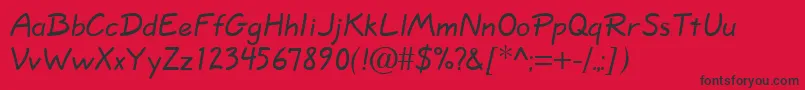 フォントQuillscript – 赤い背景に黒い文字