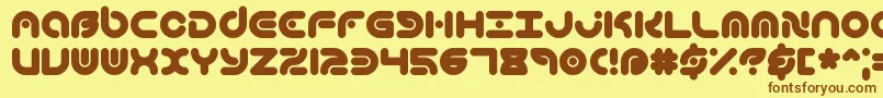 フォントTechniqu – 茶色の文字が黄色の背景にあります。