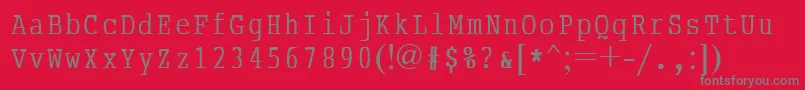 AbcTypewriterrussian-Schriftart – Graue Schriften auf rotem Hintergrund