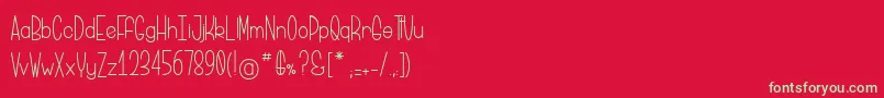BriocheAuPotiron-Schriftart – Grüne Schriften auf rotem Hintergrund