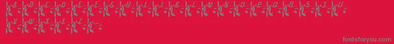 フォントFlyaway – 赤い背景に灰色の文字