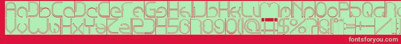 EmmiliaHollowInverse-Schriftart – Grüne Schriften auf rotem Hintergrund