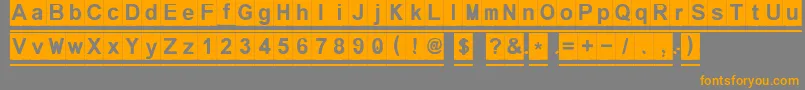 Melonseedless-Schriftart – Orangefarbene Schriften auf grauem Hintergrund