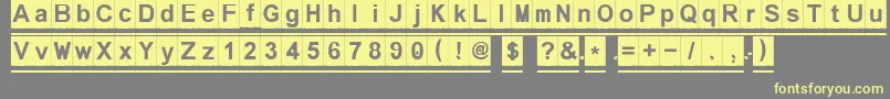 Melonseedless Font – Yellow Fonts on Gray Background