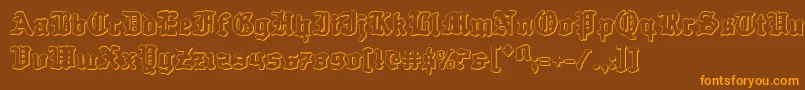 Czcionka Questknight3D – pomarańczowe czcionki na brązowym tle
