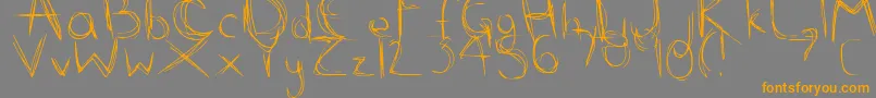 ScribbleScratch Font – Orange Fonts on Gray Background